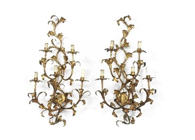 Lot 1041 - A pair of Florentine gilt metal five-branch...