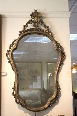 Lot 1050 - A pair of Italian carved giltwood mirrors with...