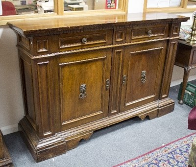 Lot 1057 - An Italian walnut credenza, 19th Century and...