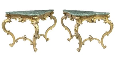 Lot 1063 - A pair of North Italian carved giltwood...