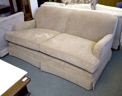 Lot 1077 - A modern two-seater sofa