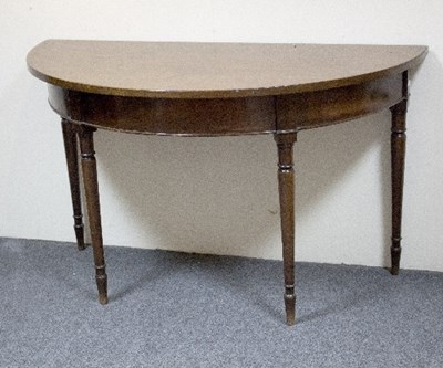 Lot 1081 - A George III D-shaped mahogany side table, on...