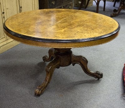 Lot 1104 - A Victorian burr walnut tilt-top table, the...