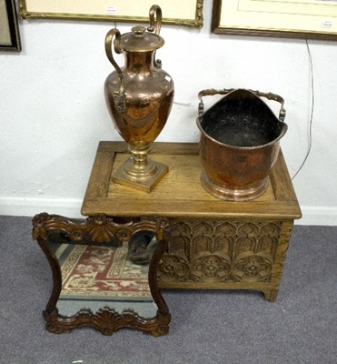 Lot 1108 - A small oak chest with Gothic carved panel...