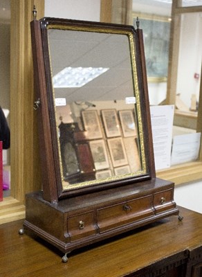 Lot 1110 - A George III mahogany dressing table mirror,...