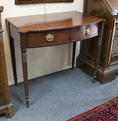 Lot 1120 - A Regency mahogany bowfront side table, manner...