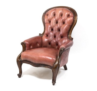 Lot 1121 - A Victorian walnut framed fireside chair with...