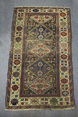 Lot 1128 - An Eastern rug, decorated in multicolours with...