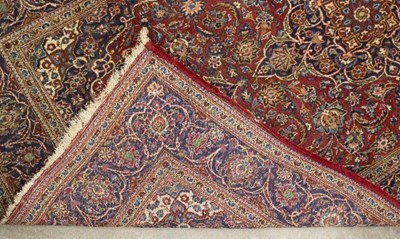Lot 1138 - An Eastern rug with central blue medallion to...