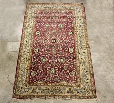 Lot 1138 - An Eastern rug with central blue medallion to...