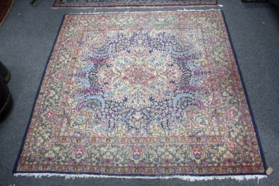 Lot 1143 - A Kirman carpet, 201cm x 200cm