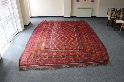 Lot 1145 - A Kelim carpet, woven in orange, brown and...