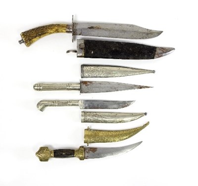 Lot 1175 - A kindjal dagger with decorative brass and...