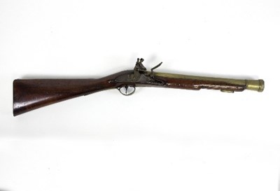 Lot 1184 - A brass barrelled flintlock blunderbuss, the...