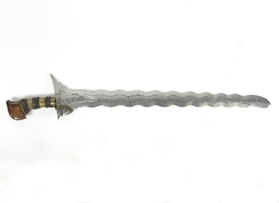 Lot 1196 - A kris dagger with serpentine steel blade and...