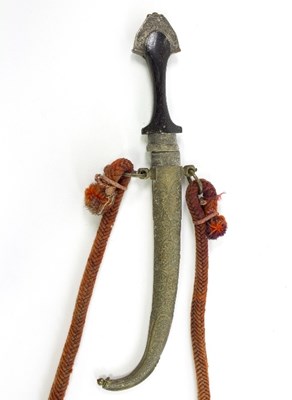 Lot 1201 - An Armenian dagger, the shaped wooden handle...