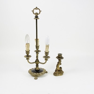 Lot 1262 - A gilt metal three-light table lamp, on...