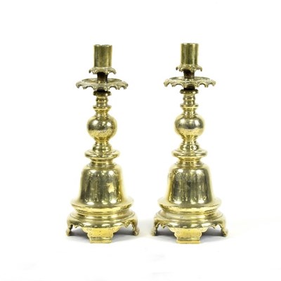 Lot 1269 - A pair of brass Dutch style candlesticks, 25cm...