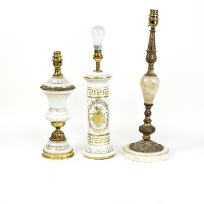 Lot 1272 - A gilt metal and marble table lamp of inverted...