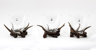 Lot 1279 - A set of three faux antler centrepieces, each...