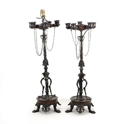 Lot 1297 - A pair of French Empire style bronze table...