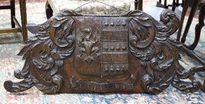 Lot 1305 - A 19th Century carved coat-of-arms with motto...