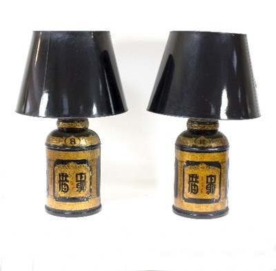 Lot 1331 - A pair of toleware tea canisters mounted as...