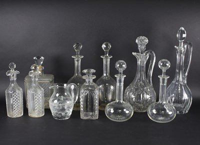 Lot 25 - A pair of double lipped cut glass decanters, a...