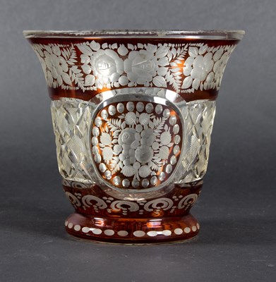 Lot 28 - A Bohemian ruby stained cut glass vase...