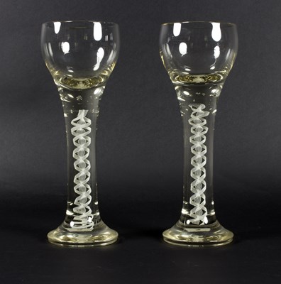 Lot 36 - Two 20th Century oversized wine glasses, with...