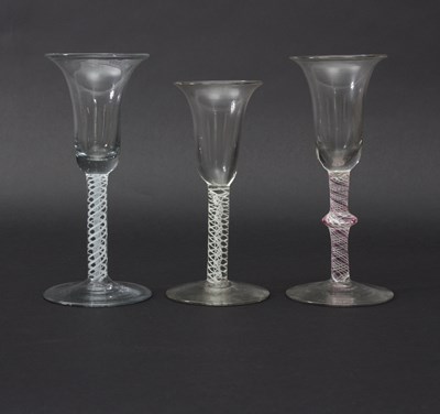 Lot 39 - Three Continental opaque twist stem wine...