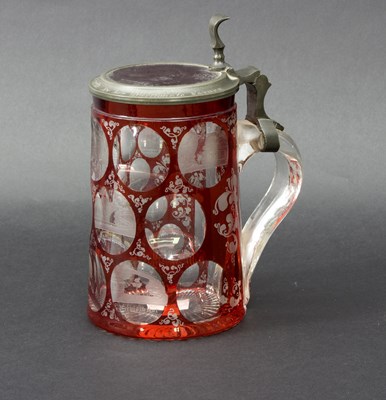 Lot 43 - A Bohemian clear and ruby flash glass tankard,...