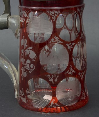 Lot 43 - A Bohemian clear and ruby flash glass tankard,...