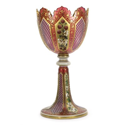 Lot 53 - A large Bohemian red glass goblet, decorated...