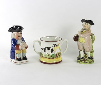 Lot 70 - A Staffordshire Toby jug modelled as a...