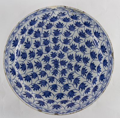 Lot 80 - An 18th Century Delft blue and white dish,...