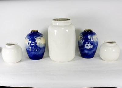 Lot 131 - A pair of Royal Doulton blue and white painted...