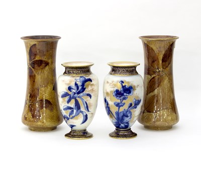 Lot 145 - A pair of Royal Doulton vases, decorated...