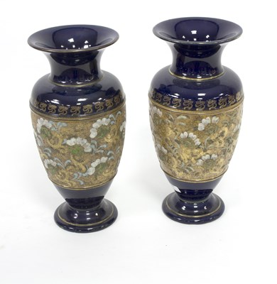 Lot 170 - A pair of Royal Doulton buff lace baluster...