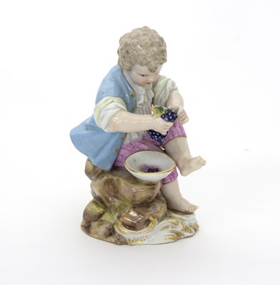 Lot 183 - A Meissen figure of a young vintner, mid 19th...