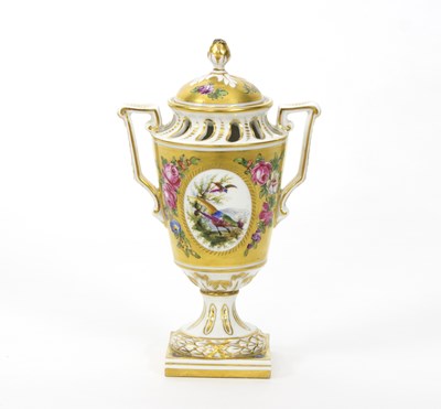 Lot 189 - A Chelsea Derby style urn and cover, decorated...