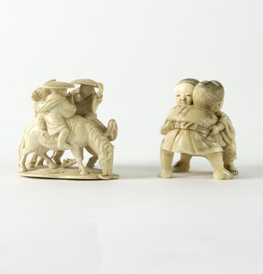 Lot 213 - A Japanese carved ivory netsuke, Meiji period,...