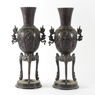 Lot 217 - A pair of Chinese bronze vases, the globular...