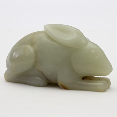 Lot 219 - A Chinese white jade carving of a rabbit,...