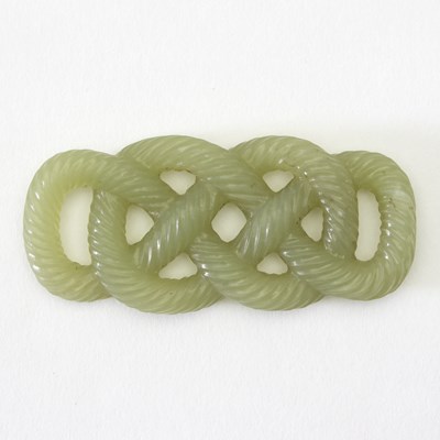 Lot 220 - A Chinese yellow jade pendant carved with...