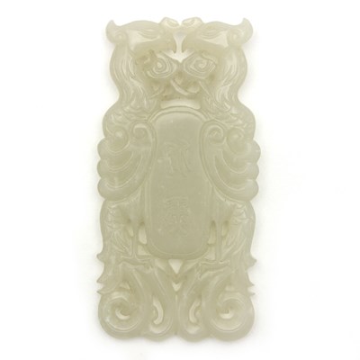 Lot 222 - A Chinese white jade carving of a double...