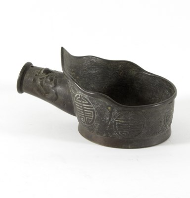 Lot 225 - A Chinese bronze silk iron or pan, impressed...