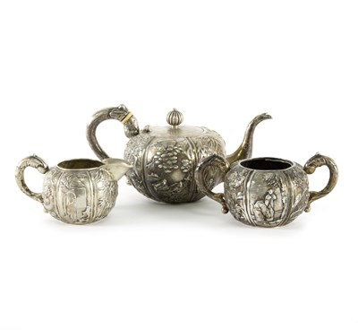 Lot 228 - A Chinese silver coloured metal three-piece...