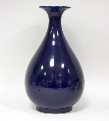 Lot 233 - A Chinese pear-shaped monochrome vase with...