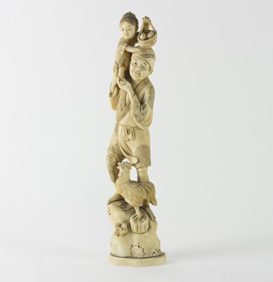 Lot 235 - A Japanese Meiji period carved ivory figure of...